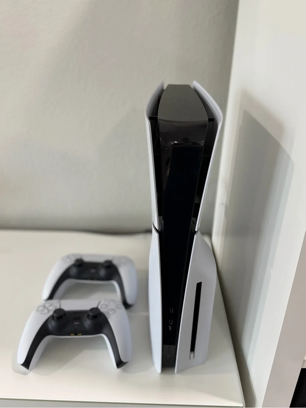 Sony PlayStation 5 Console with DualSense Controllers - White & Black